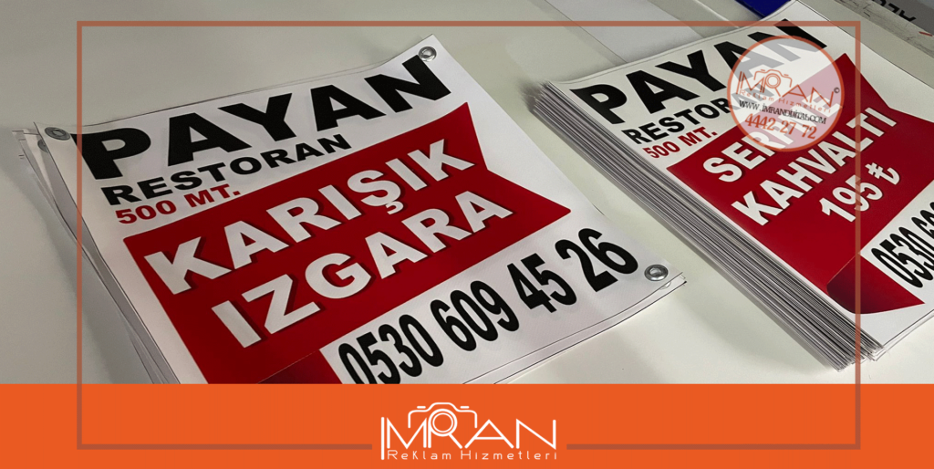 Tellere asılan branda afişler